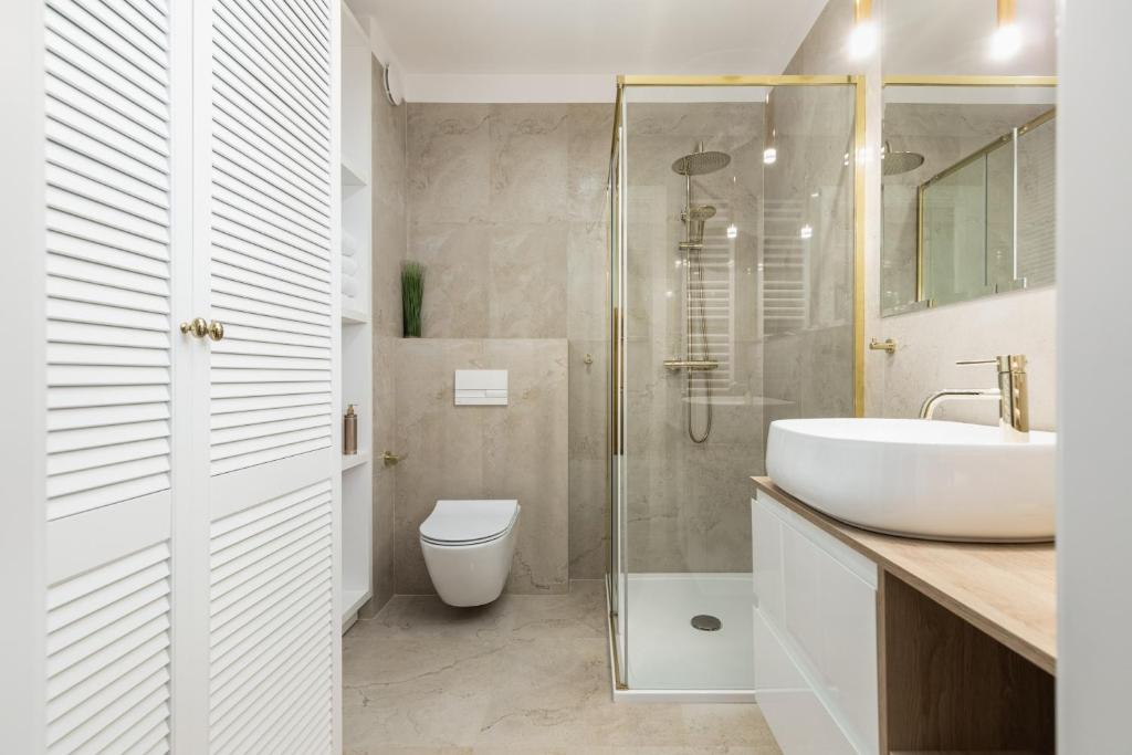 Kúpeľňa v ubytovaní Seaside Apartamenty Porta Mare I Kołobrzeg