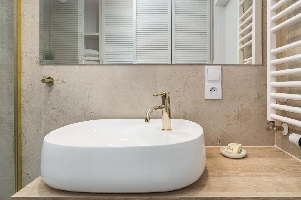 Kúpeľňa v ubytovaní Seaside Apartamenty Porta Mare I Kołobrzeg