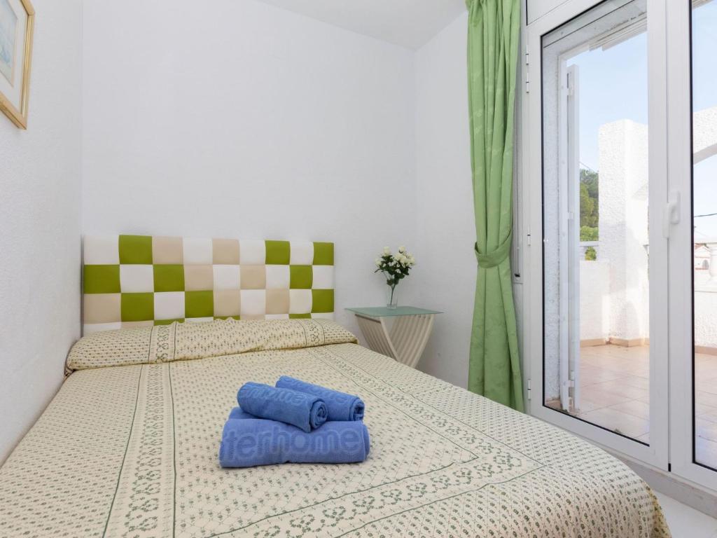 Postel nebo postele na pokoji v ubytování Holiday Home Montalt VI by Interhome