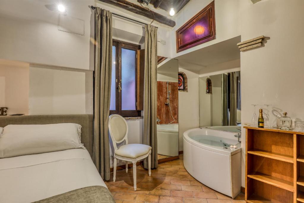 Un ou plusieurs lits dans un hébergement de l'établissement Luxury Navona