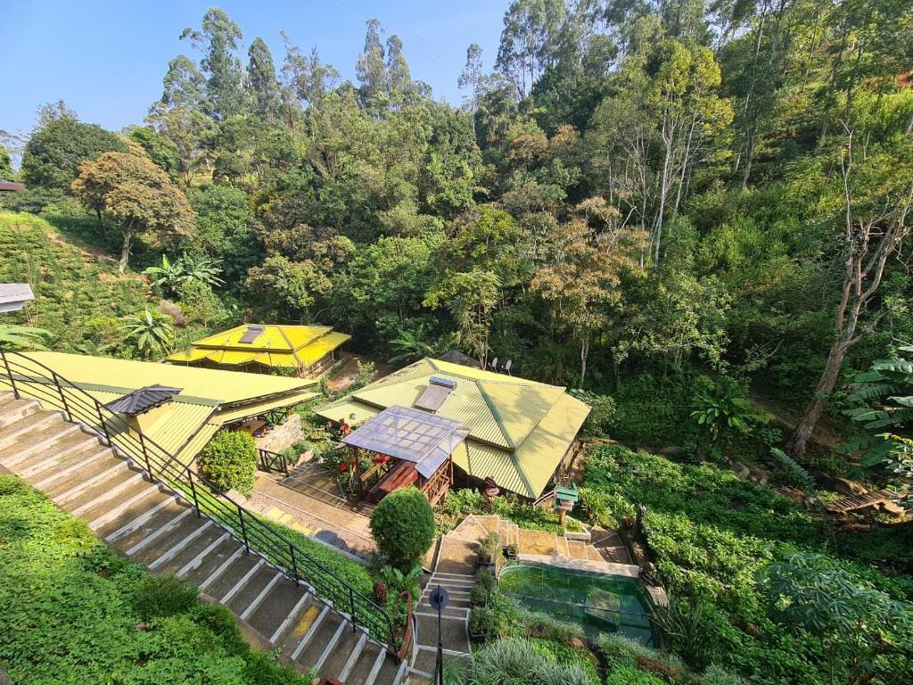 an overhead view of a house with a yellow roof at Train View Chalet in Bandarawela