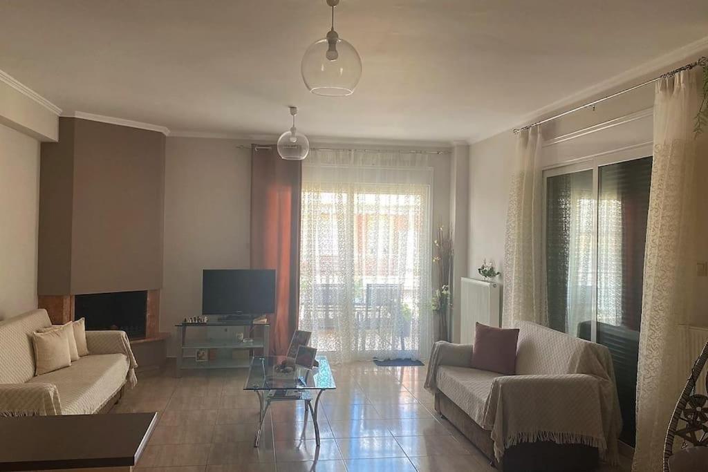 Posezení v ubytování Ρετιρέ με θέα