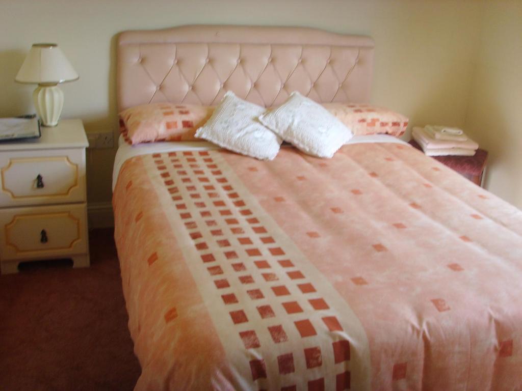 Postel nebo postele na pokoji v ubytování Springfield House B&B