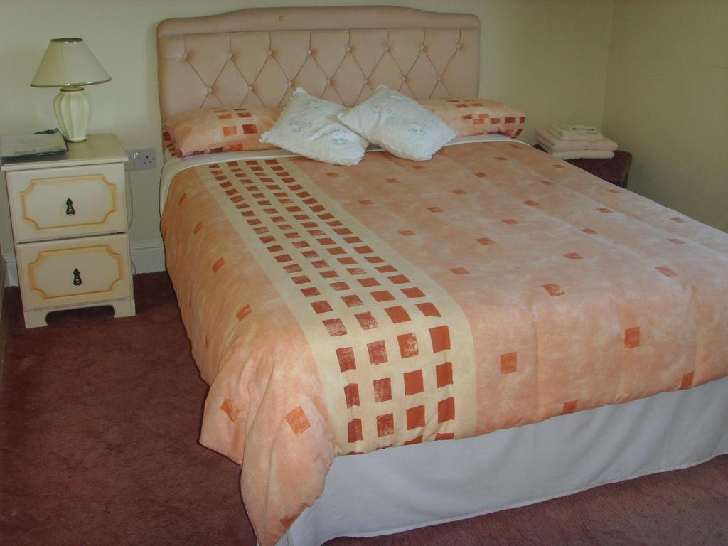 Postel nebo postele na pokoji v ubytování Springfield House B&B