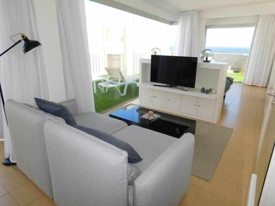 TV a/nebo společenská místnost v ubytování Terraza al Mar