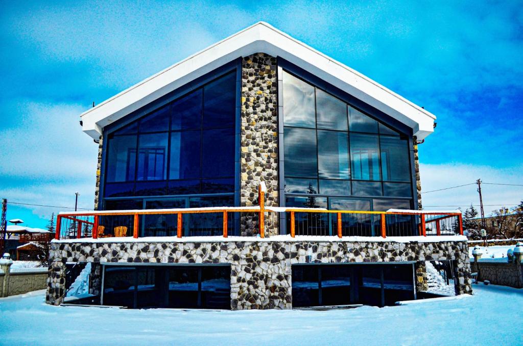 a building with a balcony on top of it at Ultra Luxury Chalet near Cappadocia - up to 9 people in Kayseri