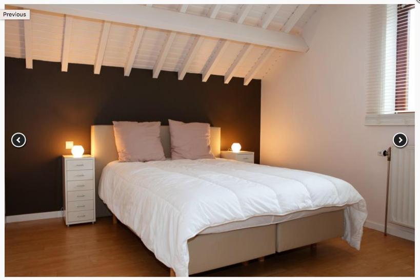 Postel nebo postele na pokoji v ubytování Gite-ardennes & wellness - Ovifat - Coquelicots 7 pers