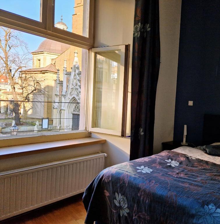Posteľ alebo postele v izbe v ubytovaní Otium Old Town Boutique