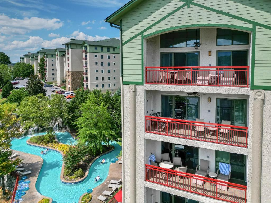 an apartment building with a view of a water park at RiverStone Condo Resort & Spa in Pigeon Forge