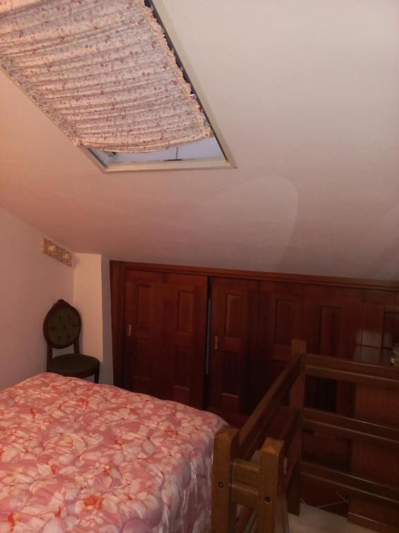 Postel nebo postele na pokoji v ubytování Lo chalet Biancaneve