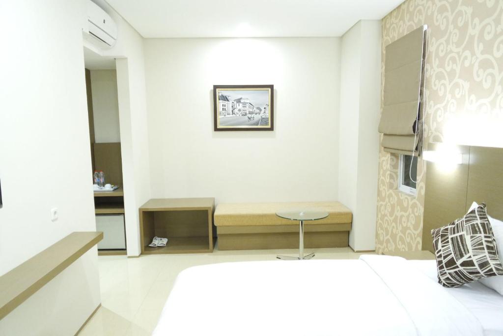 Postelja oz. postelje v sobi nastanitve Yokotel Hotel