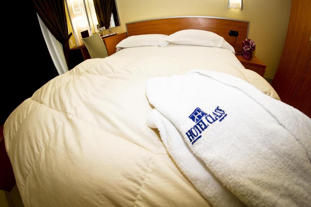 Postel nebo postele na pokoji v ubytování Best Western Hotel Class Lamezia