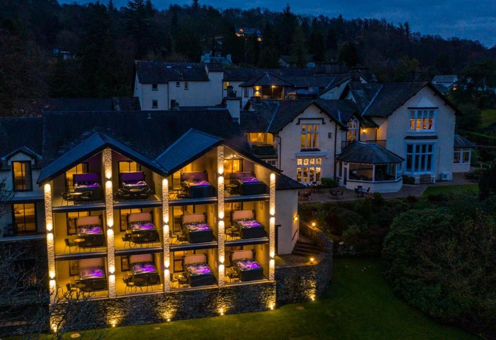 an aerial view of a large house with lights at Lakes Hotel & Spa in Bowness-on-Windermere