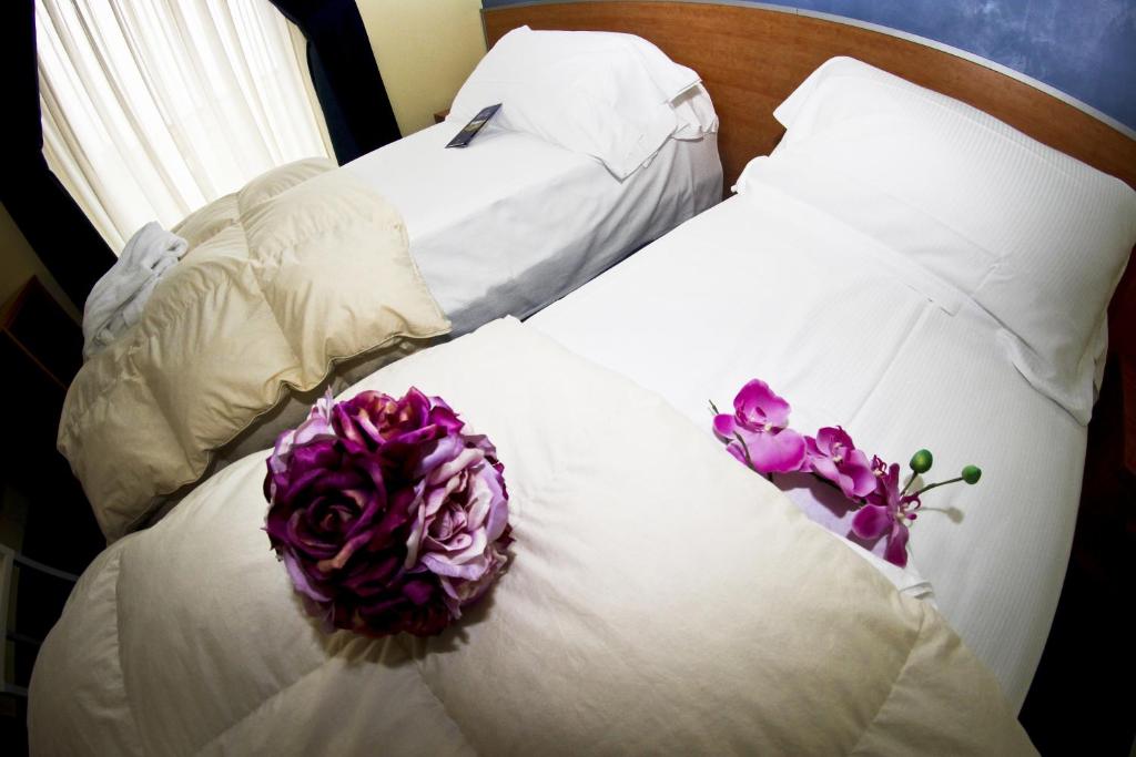Postel nebo postele na pokoji v ubytování Best Western Hotel Class Lamezia