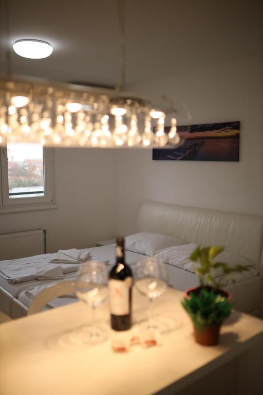 Postel nebo postele na pokoji v ubytování Apartman Lux