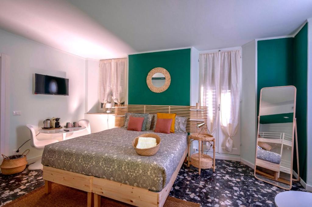 Ένα ή περισσότερα κρεβάτια σε δωμάτιο στο Mahamo Suites