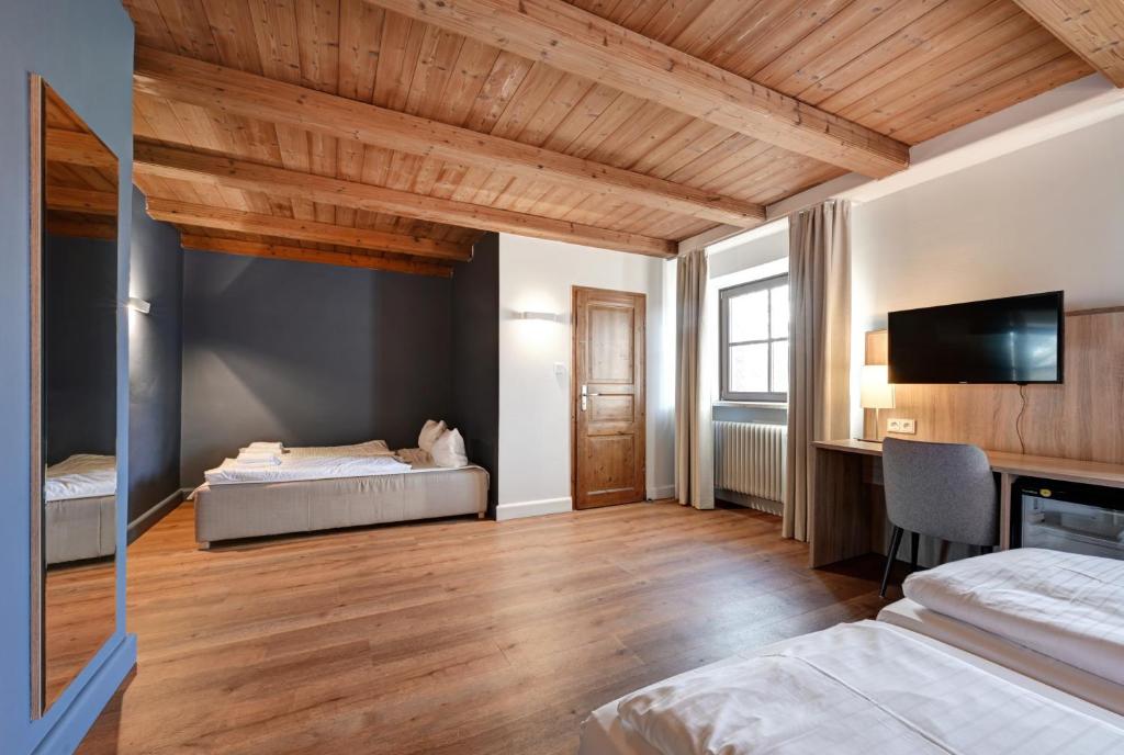 Postel nebo postele na pokoji v ubytování Hotel Schleuse