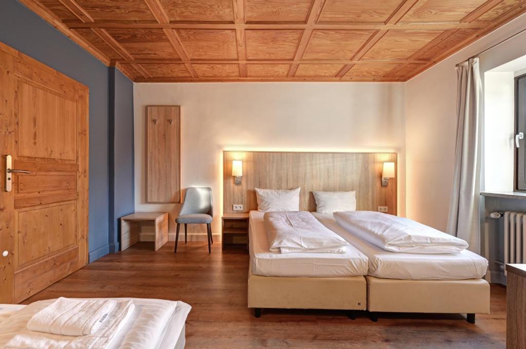 Postel nebo postele na pokoji v ubytování Hotel Schleuse