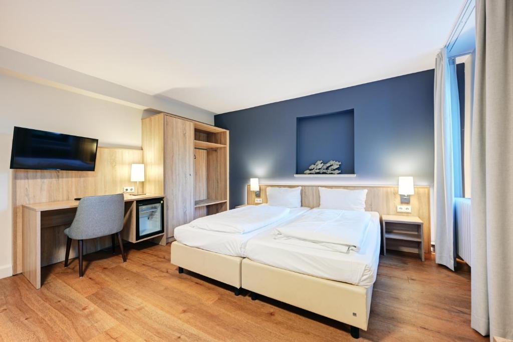 Postel nebo postele na pokoji v ubytování Hotel Schleuse
