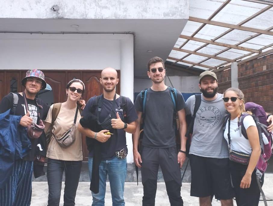 a group of people posing for a picture at RESIDENCIA TUKITUKI CASA HERMOSA IQUITOS AMAZONIA in Iquitos