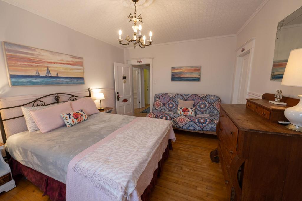 Postel nebo postele na pokoji v ubytování À Tout Venant B&B