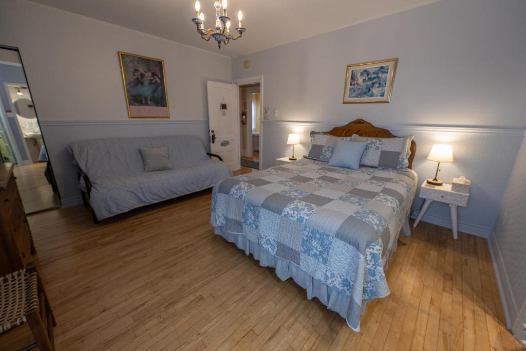 Postel nebo postele na pokoji v ubytování À Tout Venant B&B
