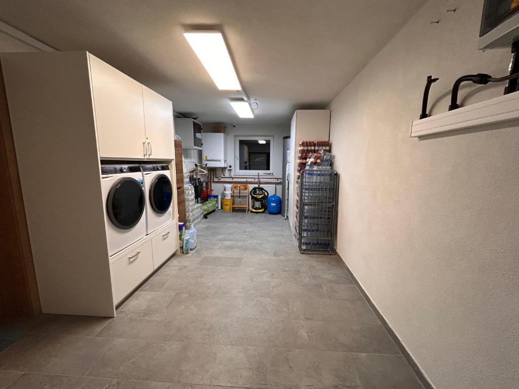 Kuchyň nebo kuchyňský kout v ubytování Apartmaji ENIA Rateče-Planica, Kranjska Gora