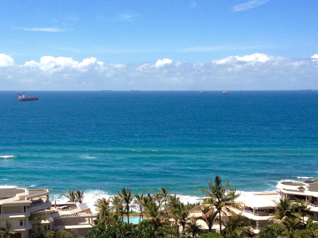 a view of the ocean from a resort at Sea La Vie Umhlanga - Direct Beach Access by WhereToGo in Durban