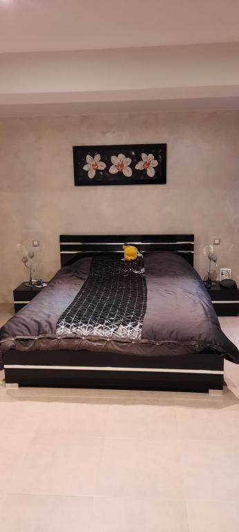 Posteľ alebo postele v izbe v ubytovaní Loft atypique et chaleureux