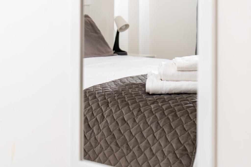 A bed or beds in a room at Sweet Home