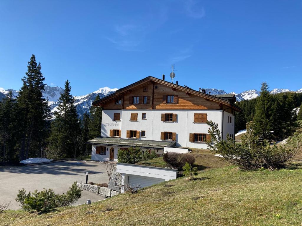 a large house on a hill with a garage at Guardaval in Arosa
