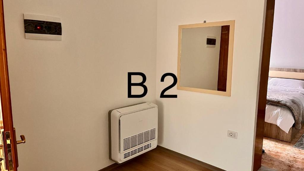 Postel nebo postele na pokoji v ubytování Dritëza