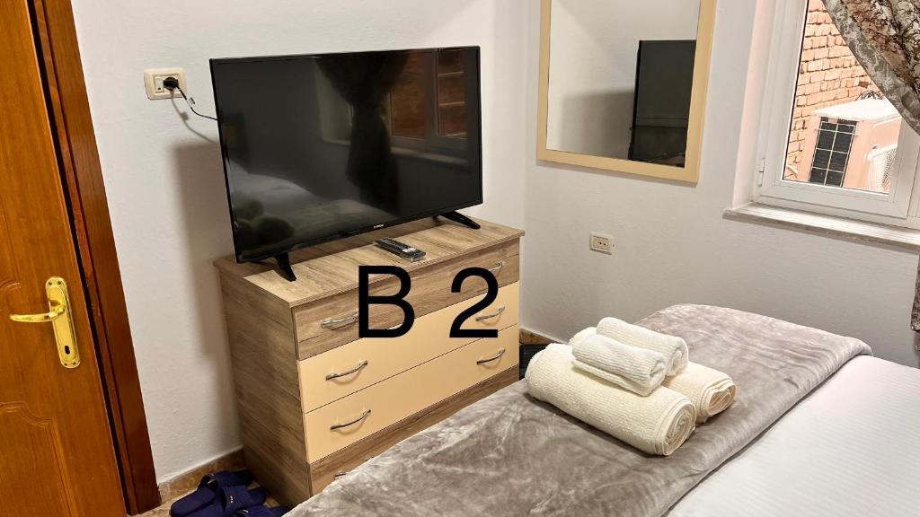 TV a/nebo společenská místnost v ubytování Dritëza