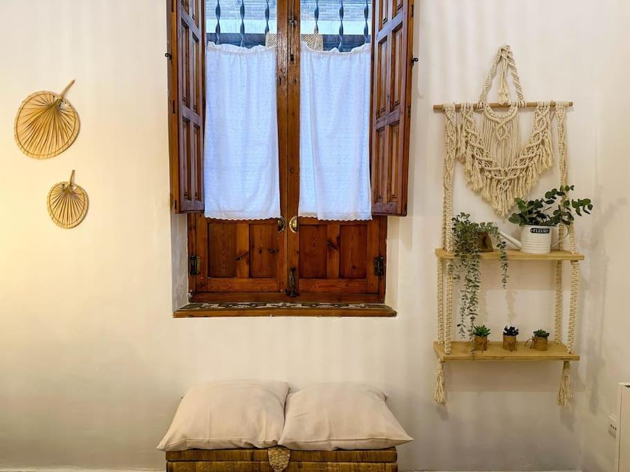 Postel nebo postele na pokoji v ubytování Aires bohemios en pleno centro.