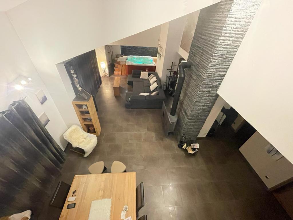 an overhead view of a living room with a couch at Appartement spacieux près des pistes in Le Monêtier-les-Bains