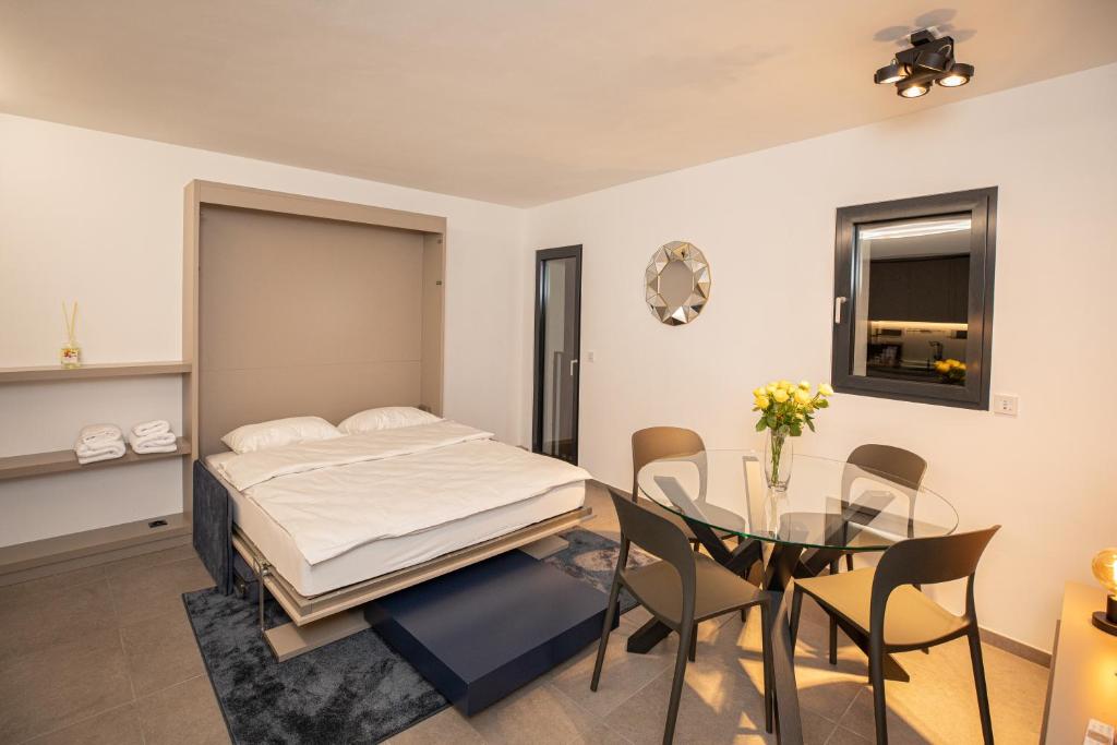 Postel nebo postele na pokoji v ubytování Residenza 3544