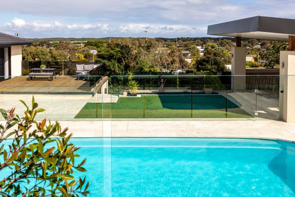 a swimming pool on the roof of a house at OASIS ON SUNSET - tranquility close to the ocean in Ocean Grove