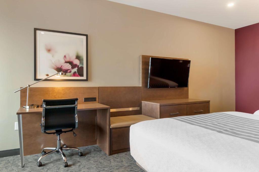 Postel nebo postele na pokoji v ubytování Best Western Plus Dauphin