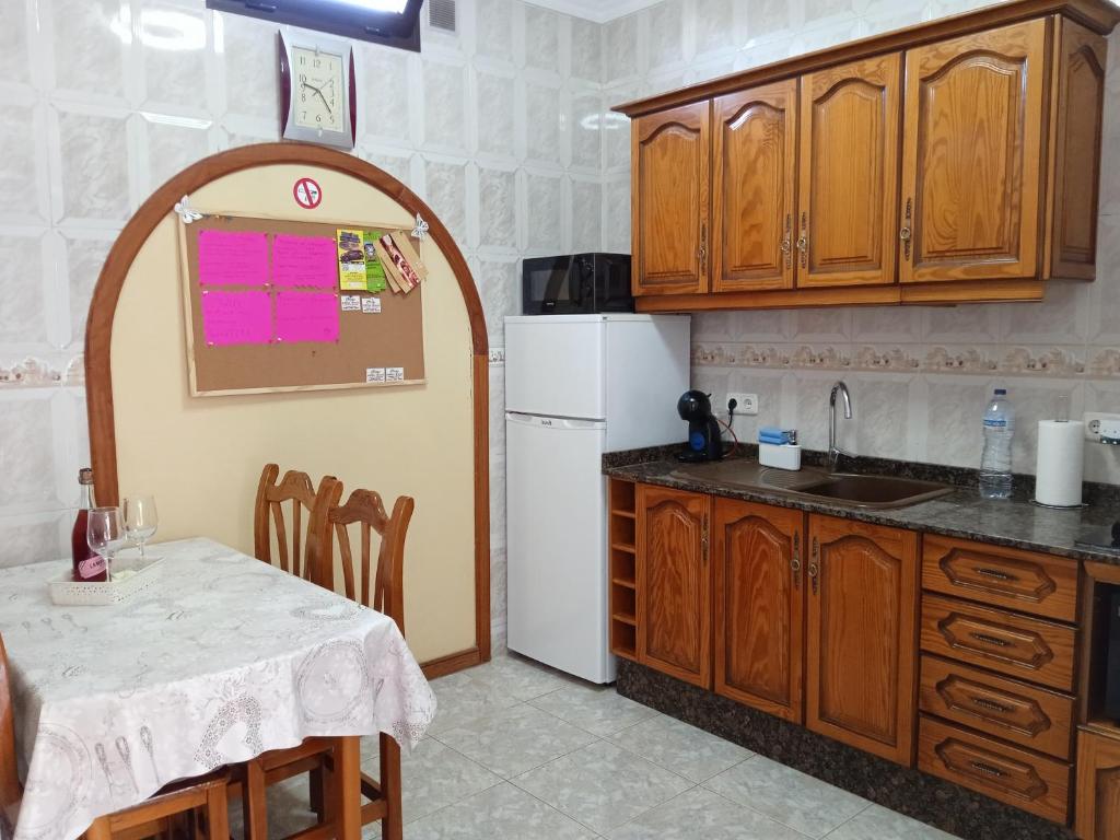 Køkken eller tekøkken på adosado cerca del mar