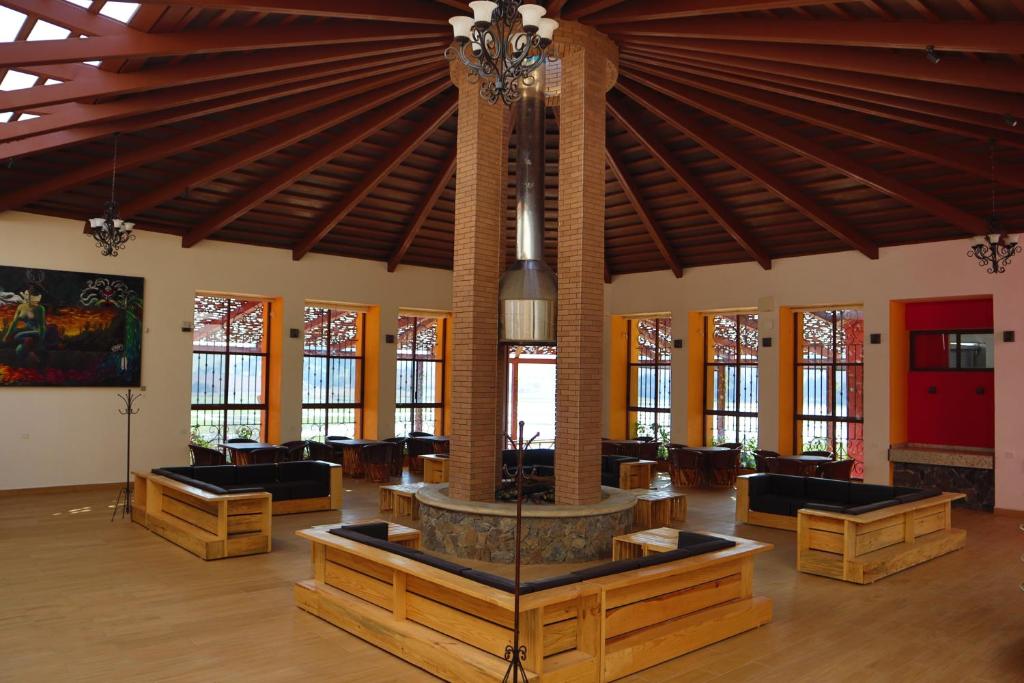 a large room with a fountain in the middle at MASIA ARAMENI in Umecuaro