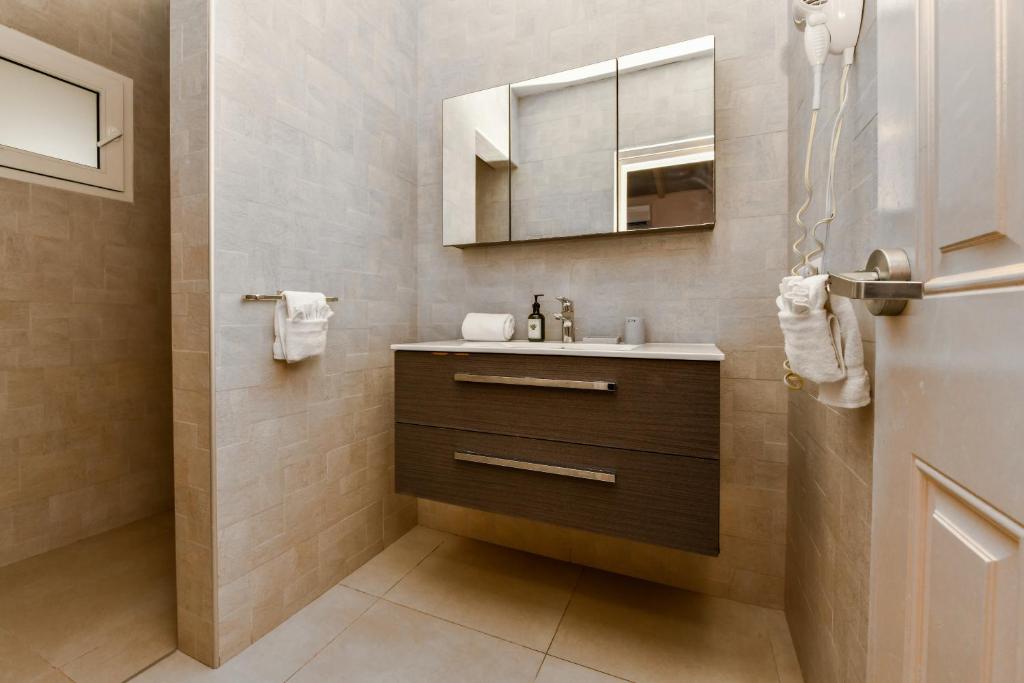 Koupelna v ubytování Boutique Hotel Swiss Paradise Aruba Villas and Suites