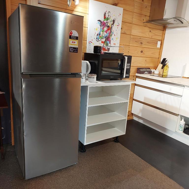 Kuchyň nebo kuchyňský kout v ubytování Tongariro Estate