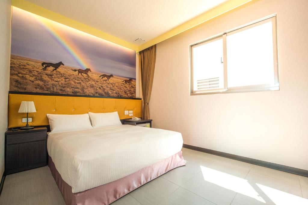 Postel nebo postele na pokoji v ubytování Dongdaemun Boutique Hotel