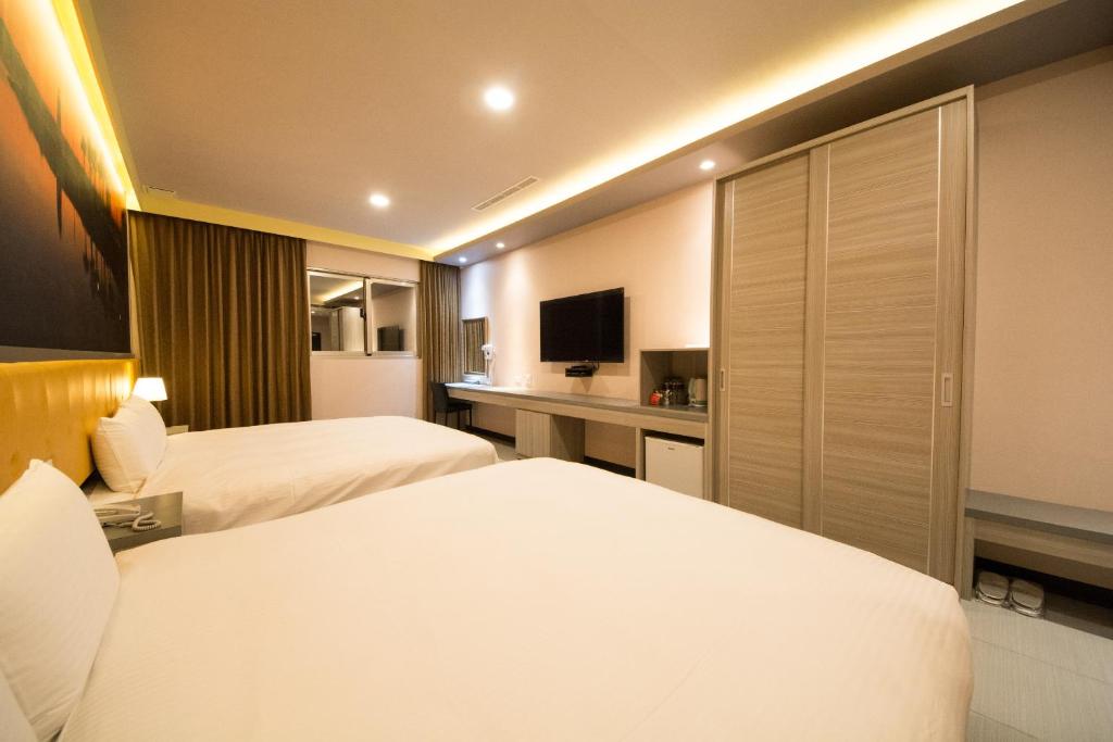 Postel nebo postele na pokoji v ubytování Dongdaemun Boutique Hotel