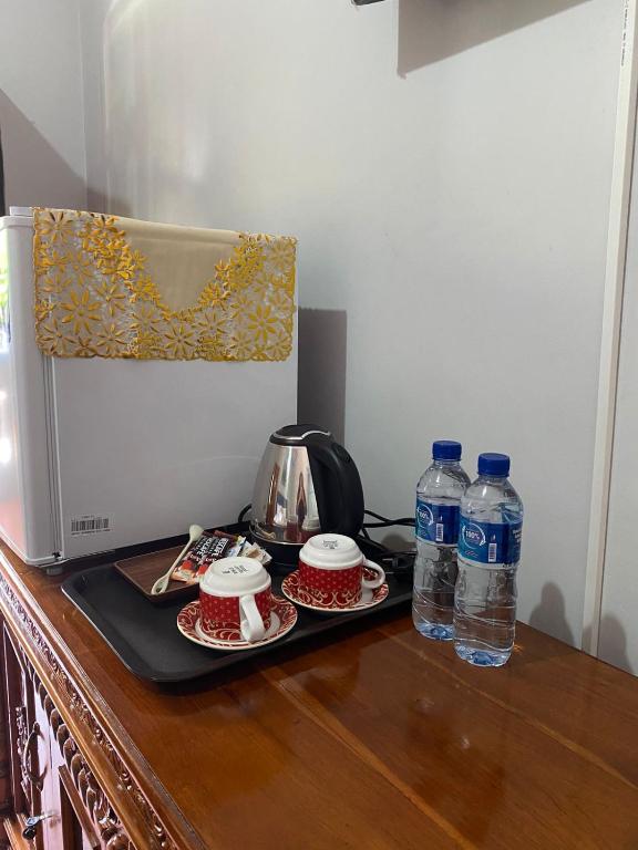 Nápoje v ubytování Guest House Pondok Puspa Ayu