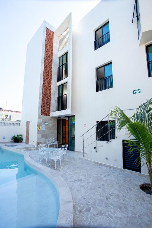 Bazén v ubytování La Casona de Sisal Hotel nebo v jeho okolí