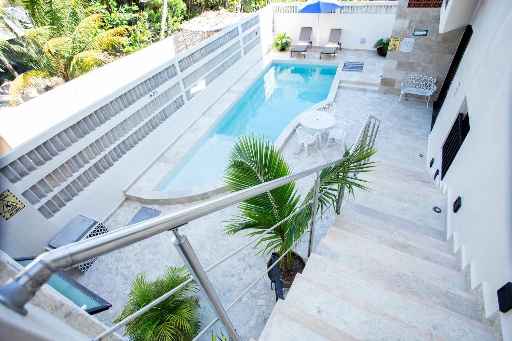 Bazén v ubytování La Casona de Sisal Hotel nebo v jeho okolí