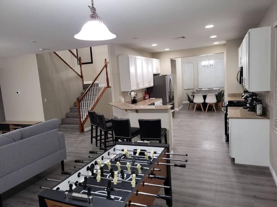 a living room with a chess board on the floor at 5 bed 3.5 baths in Las Vegas