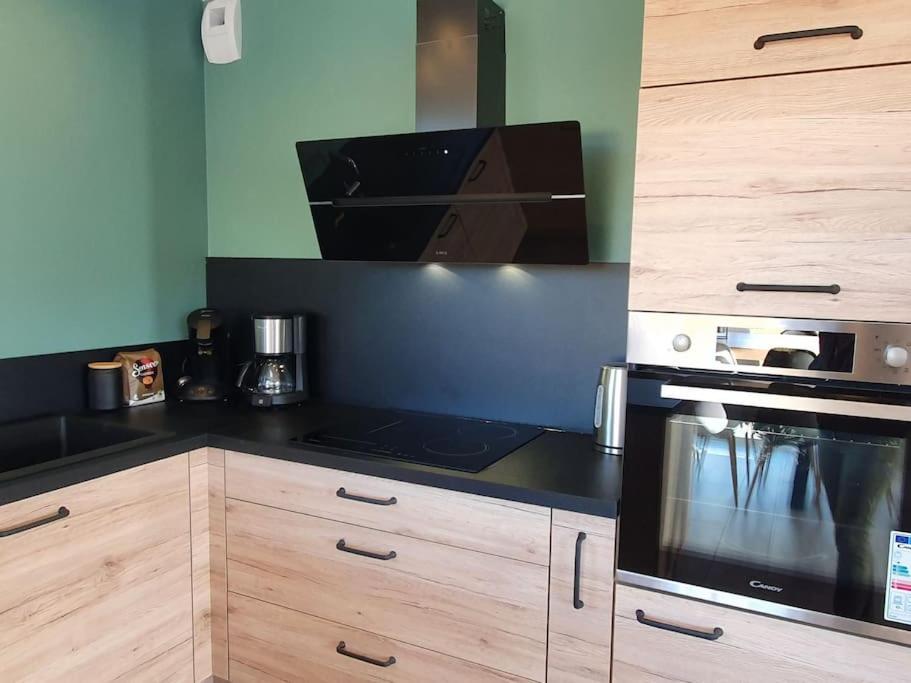 Kuchyňa alebo kuchynka v ubytovaní La maison d'Elodie
