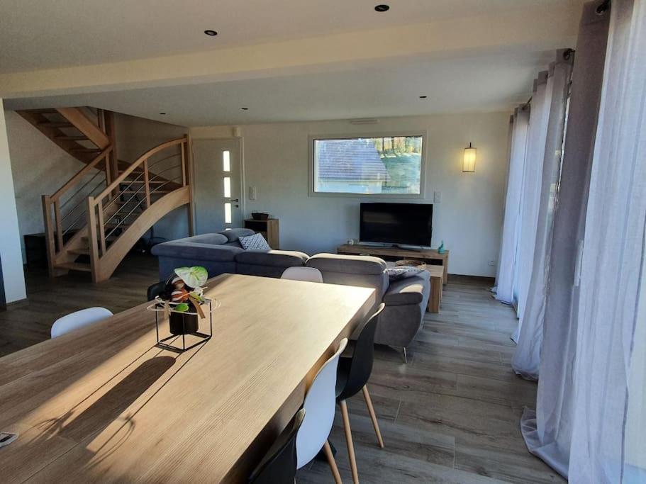 Televízia a/alebo spoločenská miestnosť v ubytovaní La maison d'Elodie